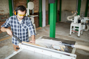 man using a table saw