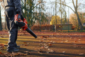 man using a leaf blower